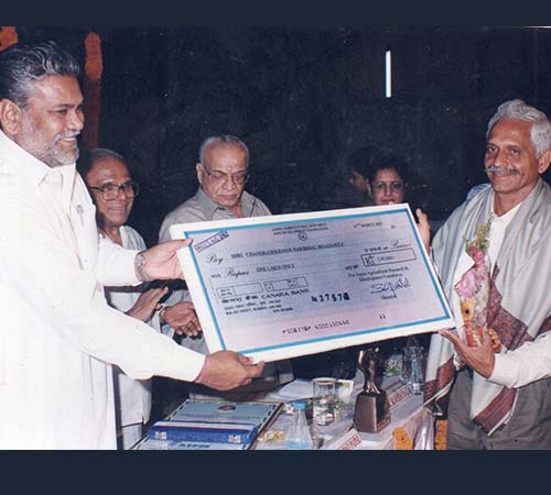 L M Patel farmer of the year award 2001 by Hon. Mr Rupala